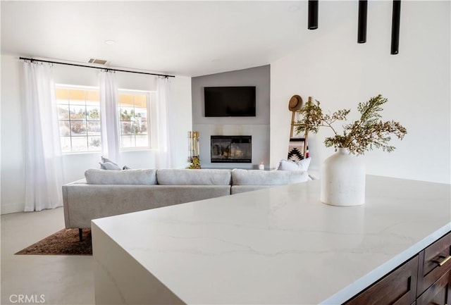 living room with lofted ceiling