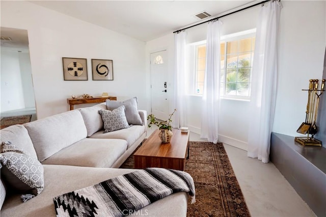 living room featuring lofted ceiling