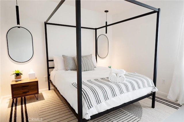 bedroom featuring light wood-type flooring