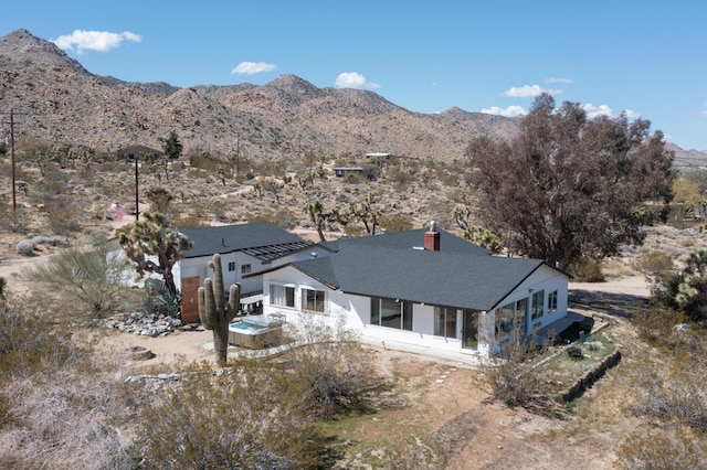 exterior space featuring a mountain view