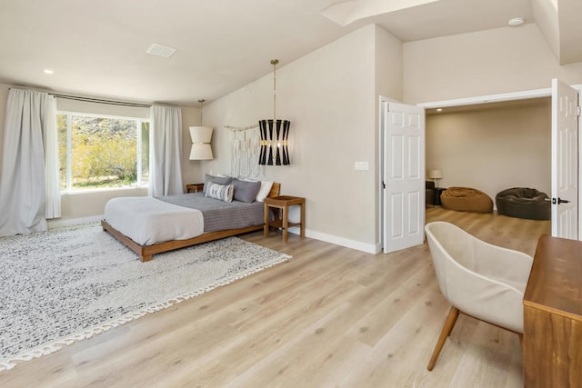 bedroom with light hardwood / wood-style flooring