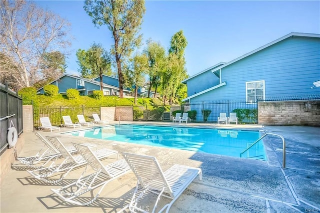 view of pool with a patio