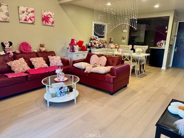 living room with light hardwood / wood-style flooring