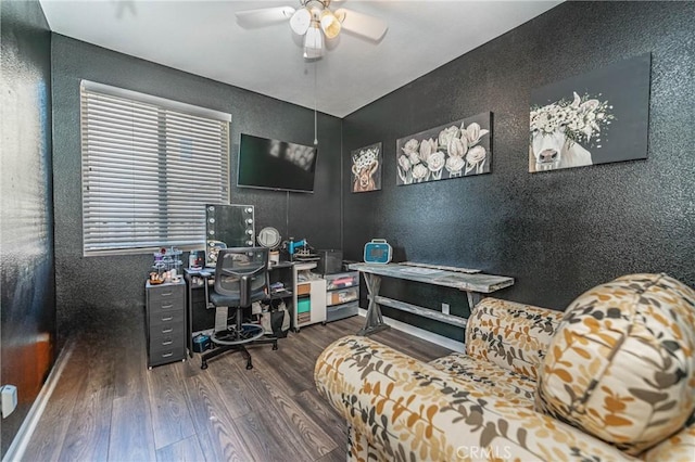 home office featuring ceiling fan and dark hardwood / wood-style flooring