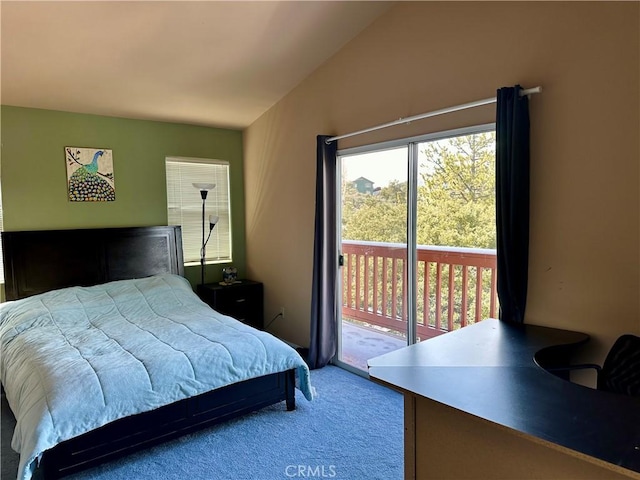 carpeted bedroom featuring access to exterior and lofted ceiling