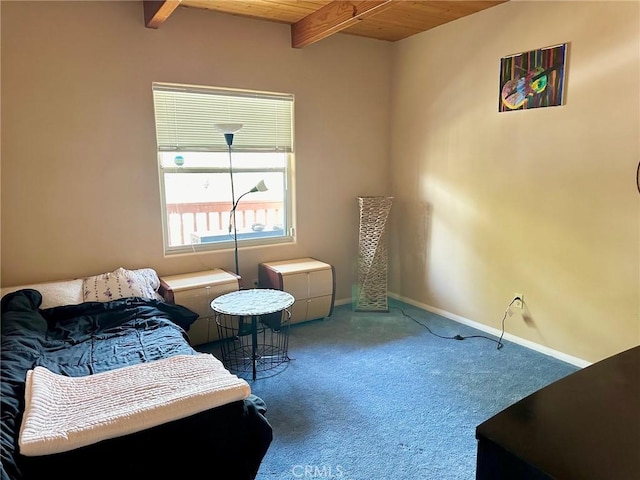 carpeted bedroom featuring beamed ceiling and wood ceiling