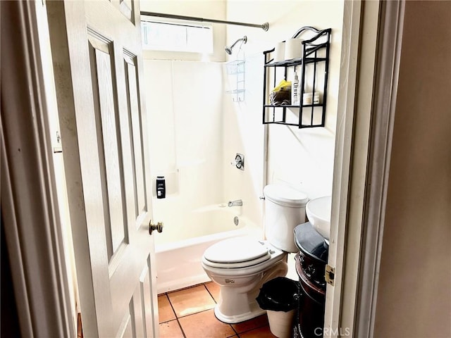 bathroom with tile patterned floors, shower / bath combination, and toilet