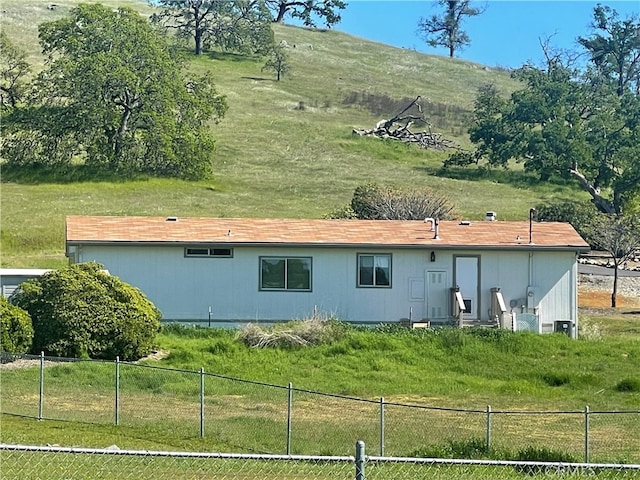 exterior space with a mountain view and a rural view