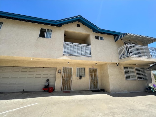 view of property featuring a garage