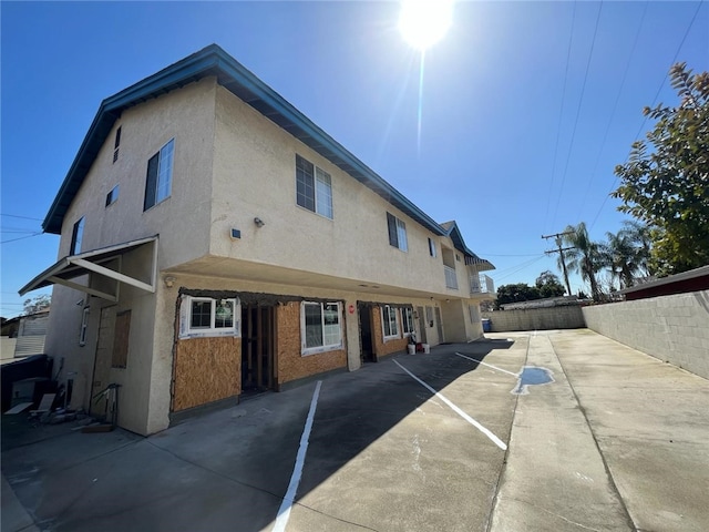 back of property featuring a patio