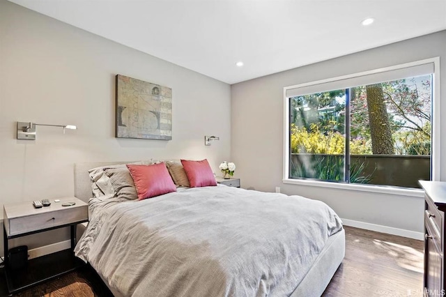 bedroom featuring hardwood / wood-style flooring