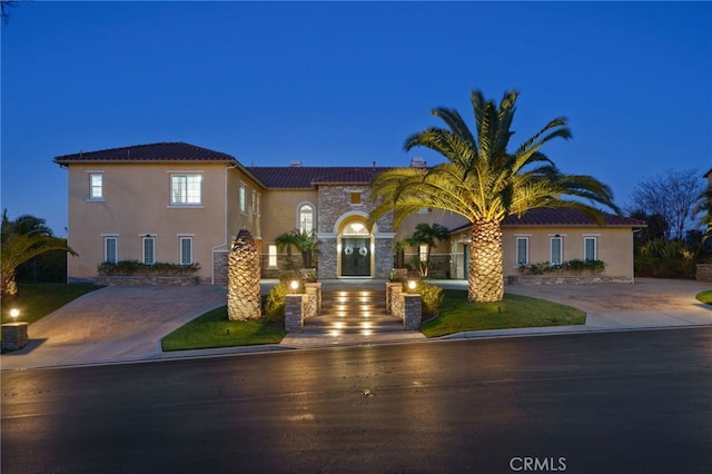 view of mediterranean / spanish house