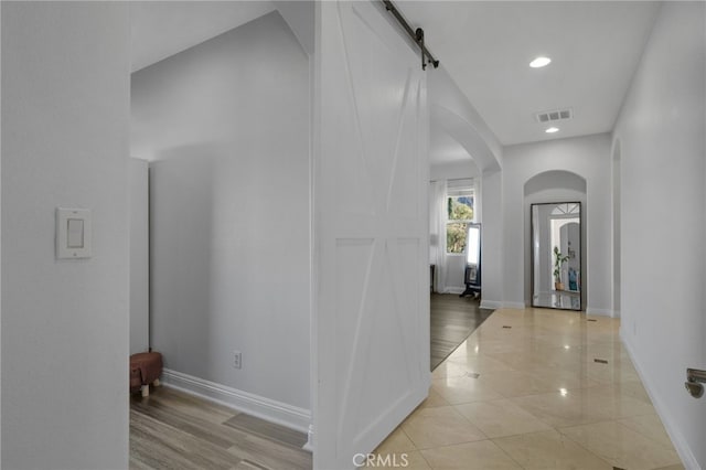 corridor with a barn door