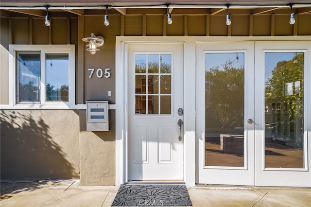 property entrance featuring french doors