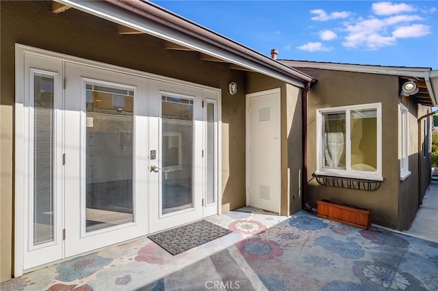 doorway to property featuring french doors