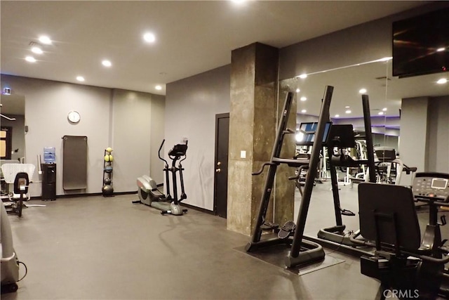 exercise room with recessed lighting