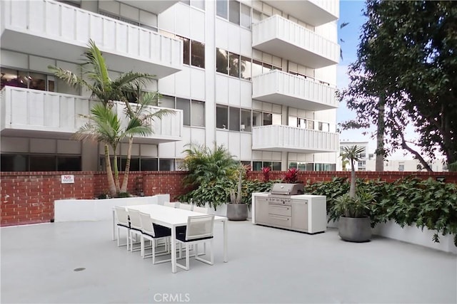 view of patio / terrace featuring outdoor dining space and area for grilling