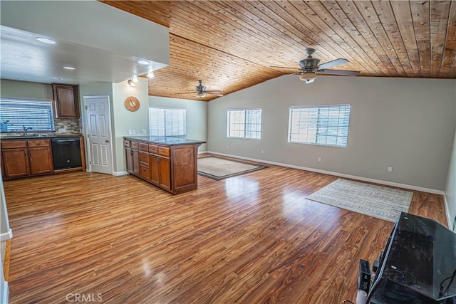 interior space with sink, black dishwasher, light hardwood / wood-style flooring, vaulted ceiling, and wood ceiling