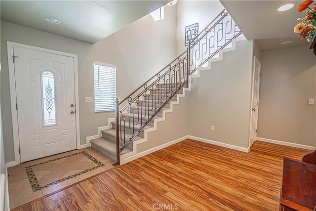 entrance foyer with light hardwood / wood-style flooring