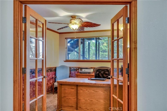 office area featuring ceiling fan, ornamental molding, french doors, and carpet
