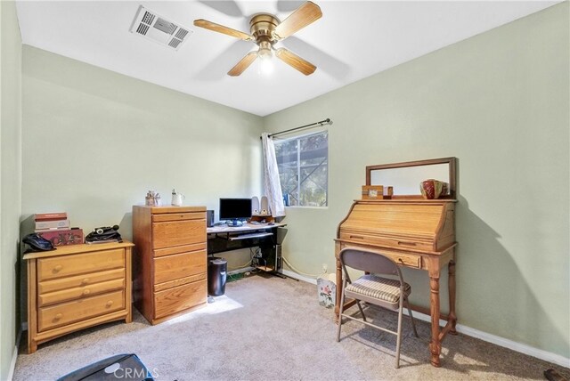 office with ceiling fan and light colored carpet