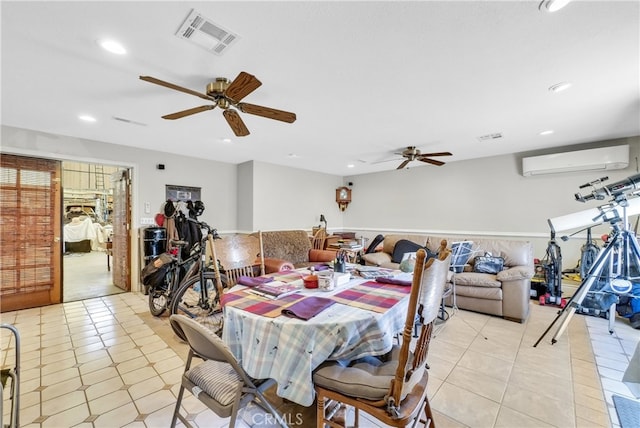 tiled dining space with ceiling fan and a wall mounted air conditioner