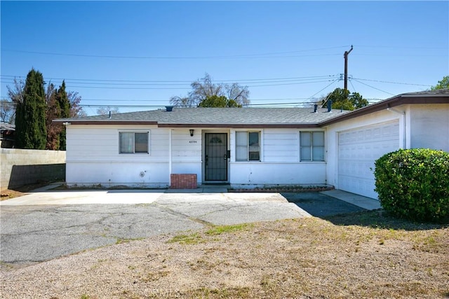 single story home with a garage