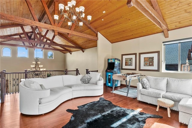 living room with wooden ceiling, beam ceiling, and an inviting chandelier