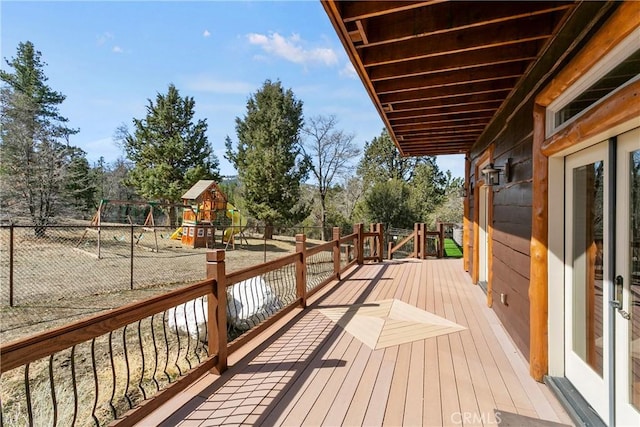 wooden deck with a playground