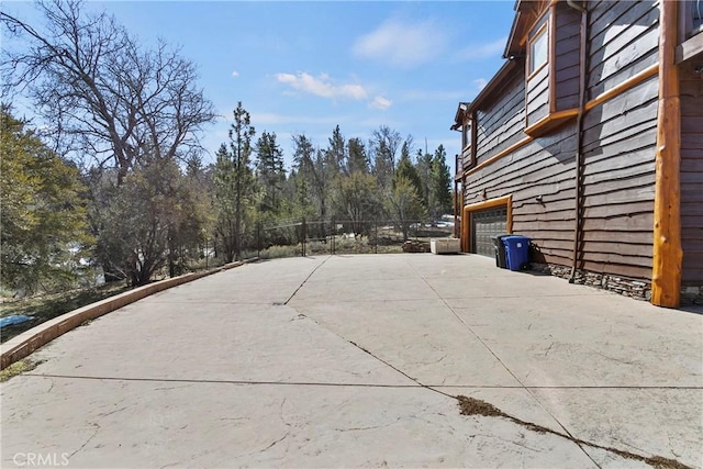 view of patio / terrace with a garage