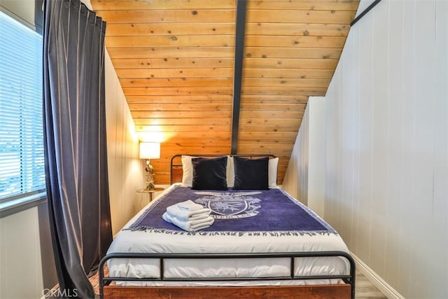 bedroom featuring lofted ceiling, wooden ceiling, wooden walls, and hardwood / wood-style flooring