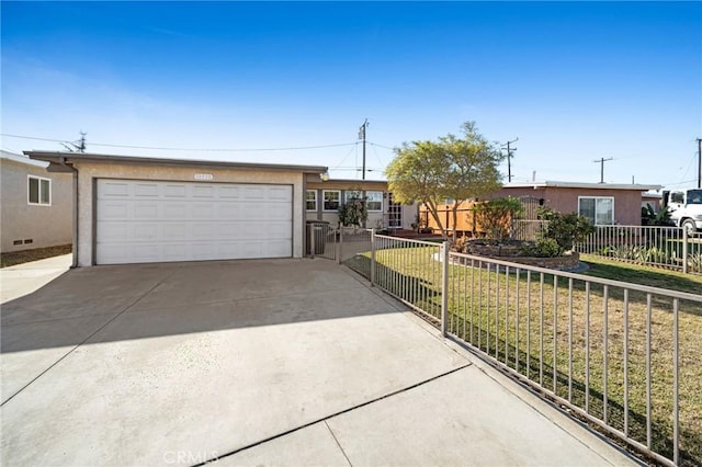 ranch-style home with a garage and a front lawn