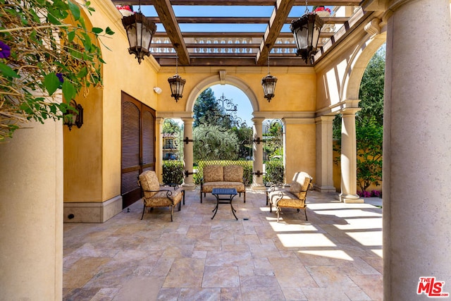 view of patio / terrace with an outdoor hangout area and a pergola