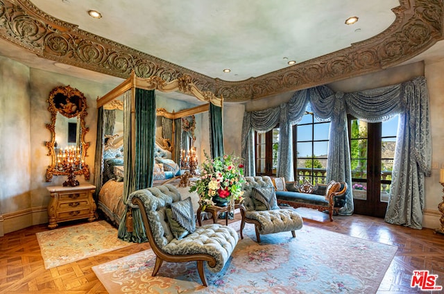 sitting room featuring parquet flooring