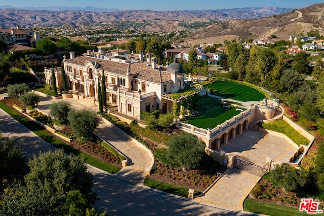 drone / aerial view featuring a mountain view