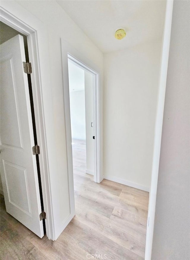 hall featuring light hardwood / wood-style flooring