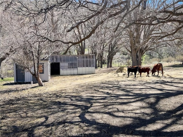 exterior space with a rural view