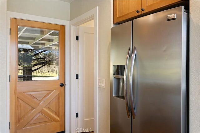 kitchen with stainless steel refrigerator with ice dispenser