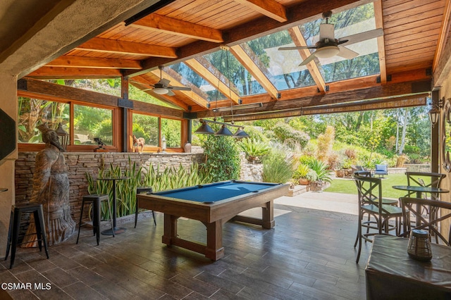 game room featuring wooden ceiling, vaulted ceiling with skylight, ceiling fan, pool table, and dark hardwood / wood-style flooring