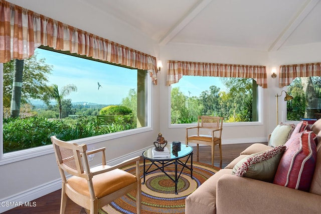 sunroom / solarium with plenty of natural light and beam ceiling