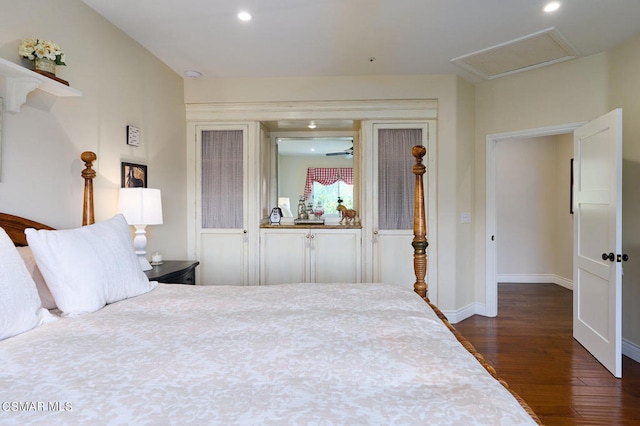 bedroom featuring dark hardwood / wood-style flooring