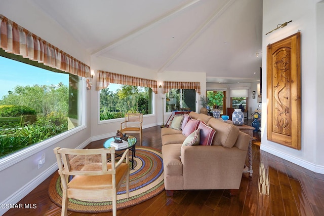 sunroom / solarium with lofted ceiling with beams