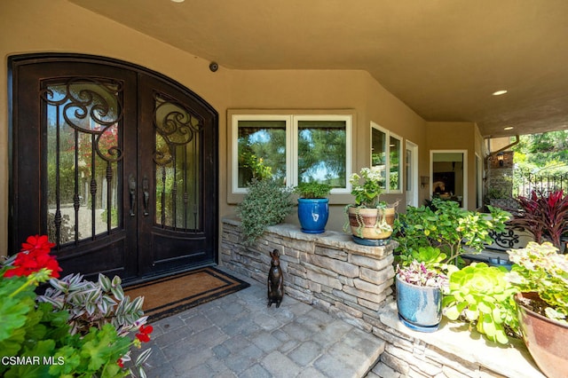 doorway to property featuring french doors