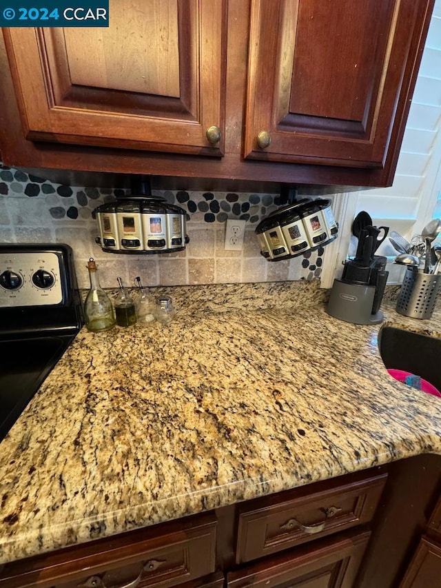 details with light stone counters and backsplash