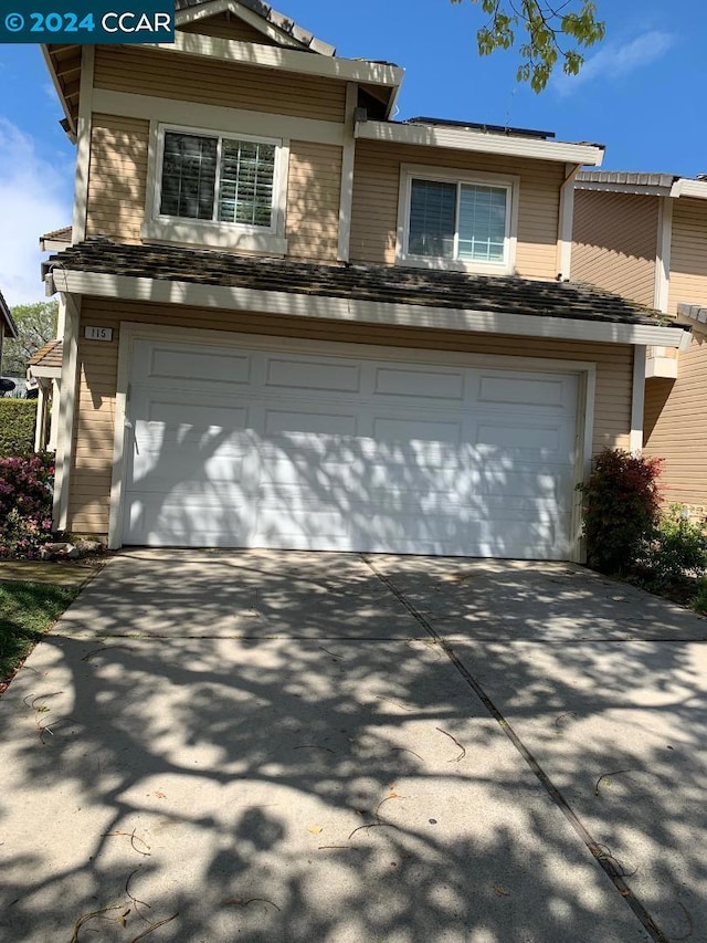 view of property with a garage