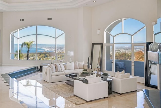 702 Via La Cuesta, Palos Verdes Estates, CA 90274 - tiled living room featuring a raised ceiling and french doors