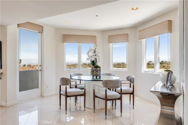 view of tiled dining space