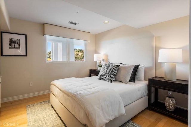 bedroom featuring light wood-type flooring