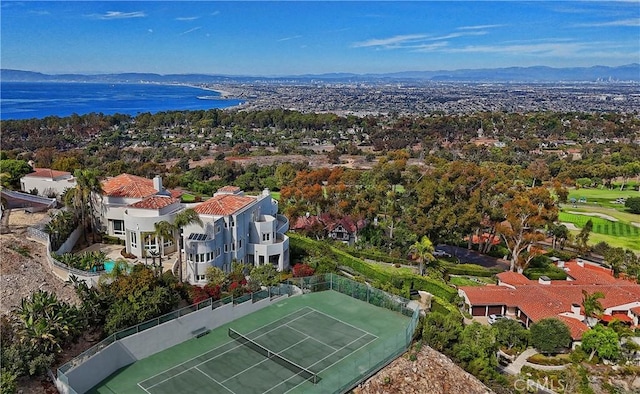 birds eye view of property featuring a water and mountain view