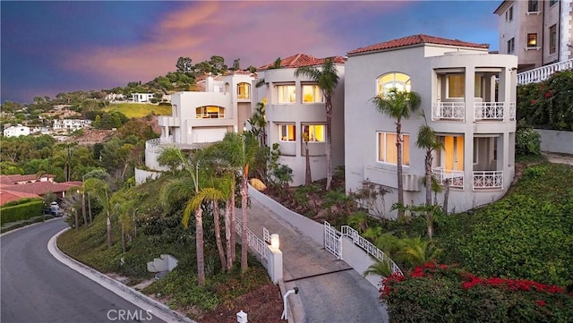 702 Via La Cuesta, Palos Verdes Estates, CA 90274 - mediterranean / spanish-style house featuring a balcony, stucco siding, and a tile roof